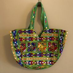 Beautiful Unique Large Eclectic Bag From Mexico. Handmade With Beads, Mirrors, Sequins And Knits. Strap Has Handmade Knits. The Whole Bag Has A Zipper That Can Enclose. Measures 19" Wide X 14" Long. One-Of-A-Kind Bag, Made Local From Mexico. Never Used. Green Beaded Bag For Summer, Summer Green Beaded Bag, Green Beaded Shoulder Bag For Daily Use, Green Beaded Shoulder Bag For Beach, Traditional Green Beaded Bag, Green Beaded Shoulder Bag For The Beach, Traditional Green Beaded Bags, Green Shoulder Bag For Summer Festival, Bohemian Green Beaded Bag