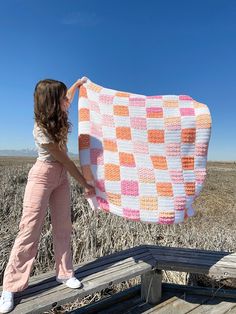 "The Check You Later Throw is a PDF DIGITAL DOWNLOAD Crochet Pattern designed by EvelynAndPeter! The Check You Later Throw is the perfect crochet pattern for those looking to create a cozy and on-trend blanket! This throw features a modern checkered design using 2 different stitches and 2 different yarns for a beautiful texture. The pattern is beginner friendly and includes a video tutorial along with the detailed written instructions. This blanket is crocheted in 9 strips instead of separate sq