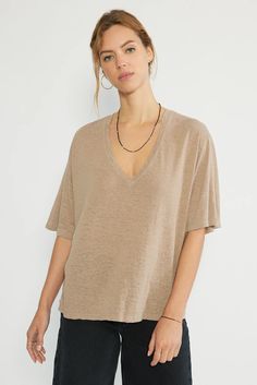 A modern take on your basic tee, with a relaxed fit and a narrow V-Neck. A soft hemp tencel jersey adds a luxe drape and unique slub texture. IMPACT & CARE 55% Hemp, 45% Tencel Made from Hemp and Tencel, two plant-based fibers created without water waste, chemicals or GMO seeds Low impact wash process uses 90% less water, 70% less energy and clean chemicals Hangtags, labels and packaging made entirely from recycled and biodegradable materials Machine wash cold with like colors, line dry Do not b Water Waste, Fashion Deals, Basic Tee, Jersey Tee, V Neck Tee, Plant Based, Seeds, Relaxed Fit, Tops & Tees