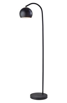 a black floor lamp on a white background