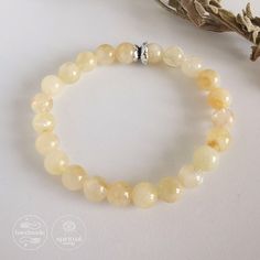 "Citrine Bracelet Details * Handmade item * 100% original natural gemstones. * Bracelet length: Around 6.5 inches / 165 mm, Elastic * Gemstone: Citrine 8mm * The elastic cord. **Intermediate apparatus and beads are non-tarnish gold plated. * P R O D U C T I O N & Q U A L I T Y  All of our jewelry are high quality handmade and unique. Made using 100% original natural gemstones. (precious and semi-precious stones) All stones are unique and may differ slightly from those shown in the pictures. No b Adjustable Citrine Gemstone Beads Crystal Bracelet, Spiritual Citrine Crystal Bracelet With Gemstone Beads, Adjustable Citrine Crystal Bracelet With Natural Stones, Citrine Gemstone Beads Bracelet As Gift, Citrine Gemstone Beads Crystal Bracelet As Gift, Amber Stretch Bracelet With 8mm Beads As Gift, Amber Stretch Bracelet With 8mm Beads For Gift, Healing Citrine Crystal Bracelet With Round Beads, Adjustable Citrine Beaded Bracelets With Round Beads