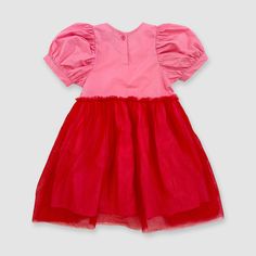 Even princesses deserve a day off. Put down the silver spoon and enjoy a day in a more casual frock. Made in 100% cotton with just the right amount of frilly tulle, this dress is just as ready for a game of gaga ball as it is a royal ball. We love to style with crew socks and sandals, a bold sneaker or our most fanciest plastic high heels. 100% Cotton with 100% Nylon. Made in China. *Sizing runs generously size down for a more fitted look. Machine wash cold, tumble dry low. Playful Ruffled Tutu Dress In Tulle, Playful Ruffled Tutu Dress, Playful Ruffled Tulle Tutu Dress, Princess Dresses With Ruffles For Costume Party, Playful Ruffled Tutu Dress For Dress-up, Summer Princess Dress For Costume Party, Holiday Tutu Dress With Ruffles For Dress-up, Holiday Ruffle Tutu Dress For Dress-up, Pink Summer Tutu Dress For Costume Party