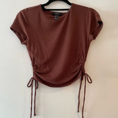 Cropped Brown Shirt - Cutouts On The Side. Never Worn Forever 21 Casual Shirt For Spring, Forever 21 Fitted Brown Top, Fitted Casual Blouse By Forever 21, Forever 21 Fitted T-shirt For Spring, Forever 21 Fitted Spring T-shirt, Forever 21 Brown Spring Top, Casual Fitted Tops From Forever 21, Fitted Forever 21 T-shirt For Spring, Forever 21 Stretch Tops For Day Out