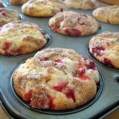 several muffins are in the pan ready to be baked