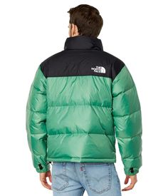 The classic 1996 Nuptse Jacket keeps you comfortable through any adventure. With DWR coating to shed light rain and quick-drying goose down insulation, you stay warm and dry. Features include an adjustable hood that packs away, adjustable cuffs, secure zip pockets and color-blocked design. At under 100 words, this cozy classic is a must-have for your feed. Green Down Puffer Jacket For Streetwear, Green Down Puffer Jacket For Outdoor, Green Down Puffer Jacket For Outdoor Activities, North Face 1996 Nuptse, 1996 Nuptse Jacket, North Face Jacket Mens, The North Face 1996 Retro Nuptse, 1996 Retro Nuptse Jacket, The North Face 1996