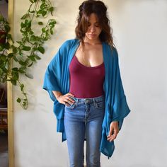 Handmade blue boho kimono robe cover up cardigan with pockets. Our kimono robe comes in a wide and loose style, one-size-fits all. Made in a vibrant turquoise blue viscose mix fabric with a light sheer, that is light and easy to wear. Finished with wide cotton quarter length sleeves in a warm mustard colour and large oversize pockets on each side. We have also added a slightly longer back panel for a more flattering fit. Pictured is our knee length version, but this kimono cardigan can be custom Brown Kimono, Bohemian Robes, Gilet Kimono, Cover Up Kimono, Kimono Boho, Modern Kimono, Cardigan Kimono, Chiffon Kimono, Kimono Duster