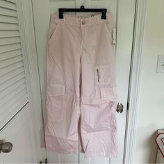 Bdg Rae Cargo Pants Rare Light Pink Color Size 8 Nwt Spring High-rise Pants With Side Pockets, High Rise Cotton Parachute Pants For Spring, Mid-rise Wide Leg Cargo Pants For Spring, Spring Mid-rise Wide Leg Pants With Cargo Pockets, Spring High Rise Cargo Parachute Pants, High Rise Pink Pants With Pockets, Pink Wide Leg Pants With Side Pockets For Spring, Pink Utility Pants For Spring, Pink Cargo Style Bottoms For Spring