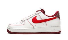 White/red leather Air Force 1 '07 sneakers from NIKE featuring signature Swoosh logo detail, embroidered logo to the rear, contrast stitching, round toe, perforated detailing, front lace-up fastening, logo patch at the tongue, branded insole and rubber sole.  These styles are supplied by a premium sneaker marketplace.  Stocking only the most sought-after footwear, they source and curate some of the most hard to find sneakers from around the world. . Team Red, Nike Air Force 1 Low, Swoosh Logo, Air Force 1 Low, Jd Sports, Red Shoes, Nike Air Force 1, White Nikes, Nike Air Force Sneaker