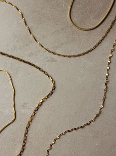 Don’t miss out on this perfect box chain necklace and add it to your shopping cart. It’s hypoallergenic & it doesn’t tangle. Crafted in stainless steel with an 18k gold layer, this necklace is perfect for everyday wear. Plus, it has a sleek texture that will make you want to touch it all the time. MATERIALS & SIZE Material: 18k titanium steel Size: 16 in. + 2 in. extension Closure: Lobster clasp JEWELRY CARE Most of our jewelry is tarnish resistant, hypoallergenic, safe for sensitive skin. Handm Yellow Gold Box Chain Necklace For Layering, Gold Box Chain Jewelry For Layering, Gold Jewelry Box Chain For Layering, Gold Stainless Steel Box Chain Jewelry, Modern Gold Plated Box Chain Necklace, Everyday Stainless Steel Snake Chain Necklace, Everyday Gold Plated Box Chain Necklace, Brass Cable Chain Necklace For Gift, Everyday Gold-tone Box Chain Jewelry