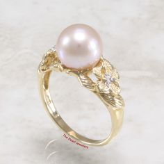 Pearls provide a sophistication that never goes out of style, an elegant masterpiece for all occasions; this Hawaiian Plumeria design pearl ring featuring a 14k solid yellow gold setting with 2 dazzling diamonds. Now available in ring sizes 6, 7 or 8 1.    Main Stone: Freshwater Cultured Pearl 2.    Main Color: Natural Peach-pink tone 3.    Grade:  premium quality 4.    Pearl Size: Approximately 8.5-9mm in diameter 5.    Ring Total Weight:  Approximately 3.3 grams 6.    Genuine diamonds: TWC =0. Pearl Cut Ring, Gold Pearl Wedding Ring, Gold Pearl Wedding Rings, Vintage Pearl Engagement Ring, Elegant Peach Ring For Anniversary, Antique Gold Pearl Ring For Wedding, Yellow Gold Brilliant Cut Pearl Ring For Wedding, Unique Yellow Gold Pearl Ring For Wedding, Pink Pearl Ring For Wedding