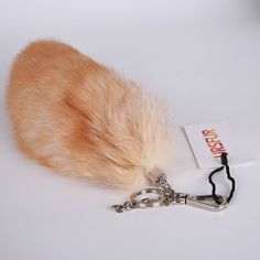 BRAND NAME:URSFUR 
PRODUCT DETAILS:Genuine Fur Tail - 100% real tail fur, feed on farm, professional healthy farming. Include quality and strong key chain ring hook.
Use for: Because it is a real fox fur pendant, it is soft and comfortable to touch. The appearance is also very fluffy. Because it grows naturally, each fox??s tail is very large and rich in fur is unique. If you like this furry touch, then this kind of real white fox fur wallet jewelry is definitely a fashion you can??t miss Single Hook Keychain, Therian Stuff, Ring Hook, Animal Tails, Fox Tail, Nine Tailed Fox, Keychain Accessories, Keychain Charm, Car Decoration