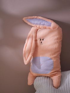 a stuffed animal in the shape of a bunny