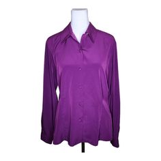 Vintage 1980s Long Sleeve Button down professional blouse womens Size 8 purple  Brand: Christie and Jill Made in Korea Size 8 100% polyester  Measurements: Chest:  underarm to underarm 21" Sleeve length: 23 1/2" Length:  from shoulder to hem 24" Pre-owned No defects noted All clothing items have been cleaned in accordance with the platform's policies and specifications. Features: * Vintage button down blouse * Spring, Summer, Winter, Fall Size: Womens 8 Condition: Pre-Owned Like New Purple Long Sleeve Formal Top, Purple Button-up Office Shirt, Purple Fitted Button-up Blouse, Purple Button-up Shirt For Office, Purple Button-up Blouse For Formal Occasions, Fitted Purple Shirt For Office, Classic Purple Formal Blouse, Purple Long Sleeve Blouse For Work, Classic Purple Blouse For Formal Occasions