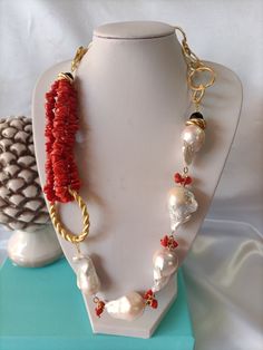 Hand made with Natural coral threads and 5 large scaramazze pearls. Nickel free chain. 925 silver clasp. Shipped in gift box. Thank you for visiting my shop. I'm available for any clarification. Mary's laboratory Coral Jewelry Set Owame Shop, Luxury Handmade Coral Jewelry, Luxury Handmade Coral Necklace, Handmade Luxury Red Pearl Necklace, Luxury Coral Necklace, Luxury Coral Gemstone Beads Jewelry, Luxury Coral Gemstone Beads Necklace, Luxury Coral Beaded Necklace, Luxury Pearl Necklace With Lobster Clasp And Round Beads