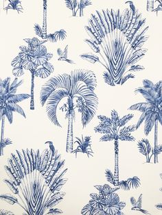 a blue and white wallpaper with palm trees