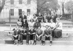 an old black and white photo of a group of people