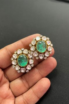 Sabyasachi-inspired Emerald Doublet Polki earrings crafted with precision, they showcase the exquisite charm of Uncut Polki studs, complemented by the brilliance of Moissanite diamonds. Embellished with traditional Jadau Kundan detailing, these earrings capture the essence of Indian craftsmanship and elegance. Elevate your ensemble with the timeless sophistication of these India earrings, a perfect blend of heritage and contemporary style. *𝐏𝐑𝐎𝐃𝐔𝐂𝐓 𝐃𝐄𝐓𝐀𝐈𝐋* * Material: Brass * Platin Green Stone Work Earrings For Reception, Formal Chandbali Gemstone Earrings, Traditional Green Earrings For Reception, Formal Festive Gemstone Earrings, Green Fusion Style Bridal Earrings For Formal Occasions, Green Earrings For Reception And Festivals, Green Earrings For Reception And Festive Occasions, Celebration Gemstone Chandbali Bridal Earrings, Round Gemstone Earrings For Diwali