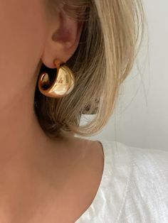 Elevate your style with our chic Gold Dome Hoop Earrings from Dylan Rae Jewelry. Crafted for timeless glamour, these bold yet lightweight hoops add a touch of sophistication to any ensemble. Shop now and redefine elegance with Dylan Rae. Dome Hoop Earrings, Everyday Chunky Metal Hoop Earrings, Thick Golden Hoop Earrings, Chunky Gold Hoop Earrings Minimalist, Big Gold Hoop Earrings, Elegant Textured Gold Plated Hoop Earrings, Thick Gold Hoops, Big Earrings, Gold Hoops