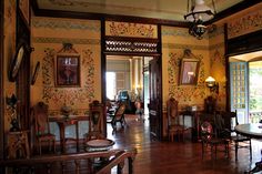 an ornately decorated dining room with wood floors