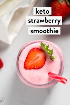 a strawberry smoothie in a glass with strawberries on the side and text overlay that reads keto strawberry smoothie