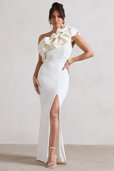 Steal the spotlight in this statement maxi, Vienne. ﻿Designed for high impact, this white piece is characterised by an extravagant asymmetric neckline thats highlighted by an artful display of ruffles. Finished with a playful leg split, Vienne is fitting for any upcoming black tie event.  Features - Premium stretch crepe- Asymmetric neckline - Ruffle trim- Invisible zip closure - High leg split- Maxi length Sizing & Fit Model is 5'8 and wears UK size 8 / US size 4 Product Information Designed exclusively by Club L London Fully lined with some stretch Premium crepe in White (92% Polyester, 8% Elastane) 157cm total length SKU: CL129995005 Club L London, Steal The Spotlight, Leg Split, Black Dress Prom, Black Tie Gala, Asymmetric Neckline, Party Dress Long Sleeve, Split Maxi Dress, Bridesmaid Outfit