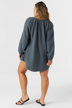 A flowy cover-up dress that has a relaxed long sleeve design and mini length fit. O'Neill Women's woven cover-up 28" In length Front button closure Solid color wash Lightweight, breathable fabrication 100% Cotton Crinkle Double Gauze Relaxed Fit Long Sleeve Top For Beach Cover-up, Chic Long Sleeve Cover-up For Daywear, Chic Long Sleeve Loungewear Cover-up, Fall Vacation Tunic With Relaxed Fit, Relaxed Fit Long Sleeve Cover-up For Vacation, Chic Beach Tunic For Fall, Chic Fall Beach Tunic, Spring Beach Tunic With Long Sleeves, Long Sleeve Beach Tunic For Spring