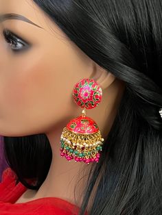 Lotus Designer Earrings Meenakari Jhumuka Earrings /gold color / Gutta Pousala Plearls Red and Green / Indian Jewelry This item is perfect for smart casual daily wear but can also be worn with a fancy outfit for a party! DETAILS: Includes two earrings only. Length: 3 inches Weight for Earring Set: 1.60oz (46 g) Earring backs push on/off. Material: Imitation gold. Red and green Beads . Finish: Premium gold finish. NOTE: We try our best to show you photos of our items as they appear in real life, Red Jhumkas For Ceremonial Use During Diwali, Festive Multicolor Chandbali Pearl Earrings, Ceremonial Red Meenakari Jhumkas, Red Pearl Earrings For Celebration, Festive Tilla Earrings For Gift, Meenakari Dangle Jhumkas For Celebration, Multicolor Meenakari Round Earrings, Festive Pearl Earrings With Meenakari, Festive Dangle Pearl Earrings For Festivals