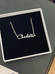 This necklace features a Dainty Sterling Silver Personalized Name Necklace with Chain. You can have your own name or word made. All carving will be made in the font as the photo.  This necklace and chain are dainty. DIMENSIONS Width - 2.3cm  Height - 0.3cm Total Weight - 3 gram Chain Size - 1.2mm This Jewellery comes in a box ready for gifting.  Please select necklace length from the drop-down box during check out. You may choose to buy Name+Chain or just our Chain without the name in the option Custom Name Adjustable Pendant Necklace, Custom Name Necklace Adjustable For Birthday Gift, Custom Name Adjustable Necklace For Birthday, Adjustable Custom Name Necklace For Birthday, Custom Name Adjustable Necklace For Birthday Gift, Customizable Silver Minimalist Necklace, Customized Silver Necklaces For Birthday Gift, Customizable Silver Chain Necklace For Gift, Customized Adjustable Sterling Silver Necklace