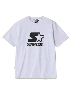 This is a trendy and unique t-shirt by STARTER that is made out of high quality and sturdy material. With distinctive mood of the design and comfortable wear, you can style it for your casual daily outfit.- Woven logo labels detail- Round ribbed neckline- Logo artwork print on the front Casual Short Sleeve T-shirt With Star Logo, Casual Tops With Star Logo And Relaxed Fit, Casual Summer T-shirt With Star Logo, Relaxed Fit Short Sleeve Tops With Star Logo, Casual T-shirt With Star Logo For Streetwear, Graphic Tee With Star Logo Short Sleeve, Summer Graphic Tee With Star Logo, Casual Tops With Star Logo For Streetwear, Summer Streetwear T-shirt With Star Logo