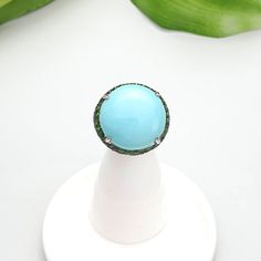 🌱Handmade 14K Turquoise ( 2.83 gram ) ring 🌱14K 585 gold and Natural Tsavorite (110 pcs) 🌱Authentic Korean jewelry 🌱Free standard shipping from Seoul, Korea with tracking 🌱Will take approximately 7-21 days to arrive, worldwide NASCHENKA is an artistic expression of Korean culture and history through traditional jewelry. We use natural and authentic stones. Each piece is thoughtfully designed by a designer and handmade by a highly skilled master artisan. Size Guide * The approximate size and Emerald Ring With Natural Stones For Gift, Gift Emerald Ring With Natural Stones, Green Turquoise Cabochon Ring, Blue Emerald Ring For May Birthstone, Round Shape, Blue Emerald Ring For May Birthstone, Round Turquoise Ring With Gemstone Accents, Turquoise Aquamarine Fine Jewelry, Luxury Turquoise Aquamarine Rings, Unique Turquoise Opal Ring For Gift