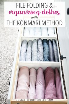 an organized drawer filled with clothes and text that reads file folding & organizing clothes with the kommari method