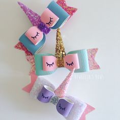 unicorn themed hair clips with glitter on them