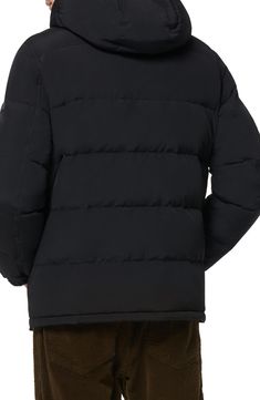 This versatile puffer features a removable hood, fluffy faux-fur in the collar and a water-resistant finish. Adjustable elasticized cuffs block out drafts, while an array of handy pockets are lined with fleece to keep your hands warm on the chilliest days. 28" length (size Medium) Front zip closure Stand collar; removable drawcord hood Elastic cuffs with adjustable snap tabs Chest snap-welt pocket; front zip pockets with fleece lining Lined, with 60% down, 40% polyester fill 100% nylon with 100% Cold Weather Solid Puffer Jacket With Padded Collar, Solid Puffer Jacket With Padded Collar For Cold Weather, Solid Down Outerwear With Padded Collar, Cold Weather Down Puffer Jacket With Faux Fur Trim, Outdoor Down Puffer Jacket With Faux Fur Trim, Cold Weather Nylon Parka With Padded Collar, Nylon Parka With Padded Collar For Cold Weather, Outdoor Puffer Jacket With Faux Fur Trim, Long Sleeve Down Puffer Jacket With Faux Fur Lining