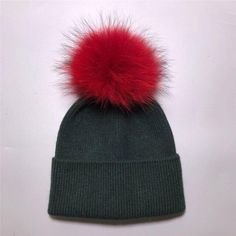 Women's wool hat with a pom-pom made of natural angora rabbit fur - Family Shopolf Trendy Winter Wool Hat, Trendy Wool Winter Hat, Trendy Wool Hat For Winter, Trendy Fluffy Winter Hats, Winter Hats With Faux Fur Trim, Winter Beanie With Pom Poms, Winter Hat With Pom Poms For Cold Weather, Beanie With Pom Pom, Beanie With Pom