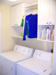 a washer and dryer in a small room