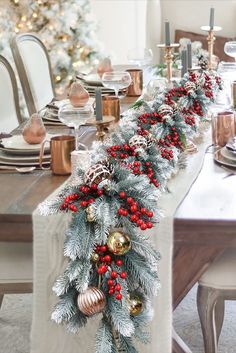 a long table with christmas decorations on it