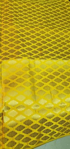 "Jaquard sun yellow brocade 44\" wide Beautiful sun yellow paisley brocade fabric sold by the yard Useable for apparel and interior decore like pillow cases, table runner, curtain or much more It is best fabric for theatrical costumes." Gold Fabric With Motifs Traditional Drape, Traditional Yellow Brocade Dupatta, Gold Banarasi Silk Fabric In Traditional Drape, Yellow Brocade Dupatta In Traditional Drape, Yellow Brocade Dupatta, Traditional Drape, Yellow Traditional Drape Brocade Dupatta, Gold Banarasi Silk Fabric With Pallu, Gold Fabric With Pallu For Festivals, Gold Festival Fabric With Pallu Detail