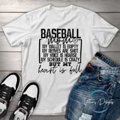 Baseball Mom Sports T-Shirt Be the #1 fan of your favorite baseball superstars in this Baseball Mom tee! Show off your team spirit without actually ever having to throw a pitch with this stylish and comfy shirt. Perfect for mamas who know the game from 1st base to home plate! No need to be a super fan - but you sure look like one! Sizes: Adult S - XL Plus Size: 2XL-3XL Shirt color: White Don't want these colors? Ask me about other colors Production time: 1-3 days Shipping: 2 - 5 business days (U Baseball Season Jersey With Letter Print For Fans, Casual Lettering T-shirt For Sports Events, Casual T-shirt With Lettering For Sports Events, Graphic Tee With Sports Lettering For Events, Sports Season Fan Apparel T-shirt With Lettering, White Sports Fan T-shirt With Lettering, Graphic Tee With Lettering For Sports Events, Graphic Tee With Sports Lettering, Sports Event Lettering T-shirt With Short Sleeves