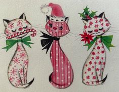 three cats wearing christmas hats and bow ties