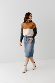 The 'Kyra' is another one of our very own exclusive denim skirts. Designed with everyday wear in mind, this skirt will pair well with just about any casual top in your wardrobe! This knee length denim skirt is 100% cotton and does not have stretch giving it a vintage vibe we love! Every woman needs a classic denim pencil skirt in her closet and this skirt is an excellent choice! Available in a classic light wash or statement black. 100% Cotton Machine Wash Cold Gentle Cycle Do Not Bleach Hang to Medium Wash Cotton Mini Denim Skirt, Medium Wash Cotton Denim Skirt For Fall, Fall Medium Wash Cotton Denim Skirt, Relaxed Casual Denim Skirt For Fall, Casual Relaxed Denim Skirt For Fall, Fall Denim Skirt With Lined Detail, Trendy Cotton Denim Skirt For Fall, Dark Wash Relaxed Cotton Skirt, Medium Wash Cotton Skirt For Fall