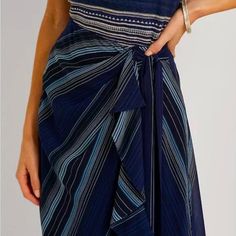 New, No Tags. Never Worn. A Faux-Wrap Silhouette, Cascading Ruffles, And Soothing Stripes In A Myriad Of Blue Hues Bring A Sense Of Fluidity To This Beautiful Midi Skirt, Which Is Cut From Delicate Crinkle Georgette For A Graceful Drape And Airy Feel. From Lauren Ralph Lauren, This Skirt Features: A-Line Silhouette Attached Self-Tie Accent At The Left Waist Creates A Faux-Wrap Silhouette Cascading Ruffle At The Front Left Waist Front Waist Pleats Intended To Hit At The Mid-Calf Fully Lined Conce Chic Pleated Wrap Skirt For Summer, Chic Fitted Blue Wrap Skirt, Elegant Blue Wrap Skirt For Summer, Elegant Blue Summer Wrap Skirt, Fitted Blue Wrap Skirt For Beach, Fitted Blue Wrap Skirt For The Beach, Chic Blue Lined Wrap Skirt, Chic Navy Skirt For Summer, Ralph Lauren Skirts