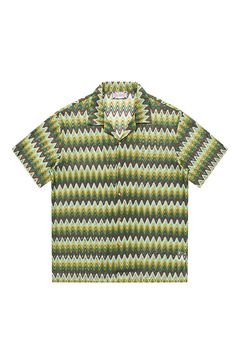 This shirt brings a retro coolness with a casual edge, echoing the rhythmic waves of summer. The Geometric Ripple Knitted Half Shirt in Watermelon is a canvas of continuity, where V-shaped ripples merge into a pattern reminiscent of a watermelon's intricate rind. The Cuban collar contributes a dash of old-school charm, fitting for any relaxed setting or as a statement piece for the more adventurous. Its breathable knit ensures a comfortable experience, making it an ideal choice for warm-weather Vacation Geometric Pattern Short Sleeve Tops, Vacation Tops With Geometric Pattern And Short Sleeves, Short Sleeve Tops With Geometric Pattern For Vacation, Vacation Short Sleeve Top With Geometric Pattern, Beach Tops With Geometric Pattern And Short Sleeves, Casual Geometric Pattern Tops For Vacation, Summer Cotton Tops With Geometric Pattern, Spring Green Camp Shirt With Graphic Print, Green Graphic Print Camp Shirt For Spring