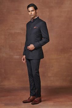 Black full sleeve bandhgala crafted in wool material. Paired with a straight pant. - Aza Fashions Traditional Festive Bandhgala For Workwear, Traditional Festive Nehru Jacket For Workwear, Classic Fitted Ceremonial Bandhgala, Fitted Classic Ceremonial Bandhgala, Classic Fitted Bandhgala For Ceremonial Occasions, Traditional Tailored Sherwani For Ceremonial Occasions, Classic Ceremonial Bandhgala With Long Sleeves, Traditional Tailored Nehru Jacket For Semi-formal Occasions, Classic Long Sleeve Bandhgala For Ceremonial Occasions