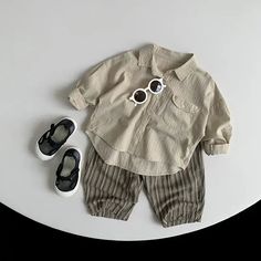 Introducing our Long-Sleeved Lightweight Lapel Shirt, the perfect blend of style and comfort. Crafted with soft cotton fabric and a casual design, this shirt is ideal for boys aged 1-6 years. The turn-down collar adds a touch of sophistication, while the solid pattern exudes timeless charm. With long sleeves and a regular fit, this shirt is perfect for summer adventures. Made with high-quality worsted fabric, it guarantees durability and breathability. Get your little one ready for any occasion with this versatile shirt. Shop now! 🌟👕👦 #LongSleeveShirt #KidsFashion Specifications: Material: Cotton Style: Casual Age Range: 1-6 years Department Name: Children Collar: Turn-down Collar Fabric Type: Worsted Pattern Type: Solid Sleeve Length: Long Season: Summer Fit: Fits true to size; take yo Sunscreen Clothing, Romper Outfit, Girls Blouse, Casual Design, Summer Adventures, Boys Top, Toddler Kids, Blue Jacket, Kids' Fashion