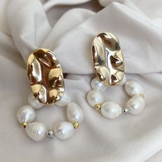 Enhance your elegance for those special moments with our exquisite statement earrings that capture the essence of the old money aesthetic.  These bold, larger-than-life pieces are designed to capture attention and create a lasting impression. Adorned with freshwater pearls, they exude sophistication and luxury. Whether it's a formal event or a celebratory occasion, these grand earrings will enhance your beauty and complete your ensemble with a touch of opulence. Let your style shine with the refined allure of our exquisite pearl-accented statement earrings. Each piece is handcrafted and may exhibit minor variations due to its handmade nature. Handcrafted in the USA Brass is a metal that combines durability with affordability, making it a wonderful choice for crafting beautiful pieces that Affordable Statement Pearl Earrings Gift, Affordable Statement Pearl Earrings As Gift, Coquette Old Money, The Old Money Aesthetic, Cottagecore Minimalist, Bolt Earrings, Enhance Your Beauty, Money Aesthetic, Homemade Jewelry