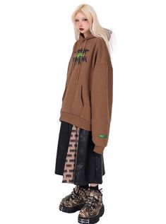 Oversized hoodie in a rich brown color with a street-inspired graffiti-style logo print on the chest. Features a roomy kangaroo pocket and an adjustable drawstring hood. The logo combines black and neon green colors for a bold contrast against the brown fabric. Relaxed fit with dropped shoulders for a casual, urban look. Model info Height: 160cm Weight: 43kg Wearing size: M Taobao Brands, Graffiti Logo, Angel Dress, Urban Looks, Graffiti Styles, Hoodies For Sale, Oversize Hoodie, Womens Maxi Dresses, Top Trends