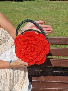 Handmade crochet purse like rose.  This handbag is a stylish and elegant accessory that easily matches almost every outfit. It can be used as an evening handbag. Unique design, giving it an exclusive look. You are sure to catch the attention of others with your original style. The bag opens at the top. It is made of durable polyester cord. One side is orange color other side is dark green. Handbag is comfortable, you can put in bag phone and other things for women. It will be great gift for moth Handmade Tote Evening Bag As Gift, Handmade Crochet Tote Bag For Party, Handmade Orange Top Handle Shoulder Bag, Orange Handmade Top Handle Shoulder Bag, Elegant Hand Knitted Crochet Bag For Gift, Elegant Hand-knitted Crochet Bag For Gift, Orange Top Handle Shoulder Bag Gift, Elegant Orange Bag Gift, Crochet Evening Bag As Gift