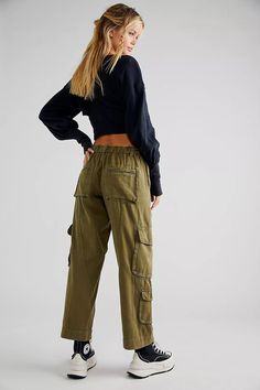 The coolest way to cargo, these timeless pants are featured in a low-rise, slouchy straight silhouette with utility-style pockets throughout and smocked waist for ease. Zip fly and button closure Drawstring waist feature Oversized pockets throughout Ankle-length Care/Import Machine Wash Cold Import Measurements for size small Waist: 32.5 in Hips: 41.5 in Rise: 10 in Inseam: 29.5 in Cargo Pant, Loungewear Shorts, Bottom Clothes, Tahiti, Small Waist, Scarf Hairstyles, Jeans Brands, Boho Outfits, Drawstring Waist