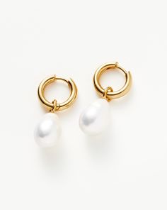 Baroque Pearl Drop Tunnel Mini Hoop Earrings | 18ct Gold Plated Vermeil/Pearl. Introducing an Elevated Collection of Everyday Essentials that are Anything but Basic. Our Best Selling Baroque Pearl Earrings, Now Featuring Tunnel Mini Hoops. They Also Have a Hidden Hinge for a Seamless Closure. Two Earring Styles in One, Remove the Charm to Wear the Mini Hoops on their Own for a Simple Statement. Metal: 18Ct Recycled Gold Plated Vermeil on Recycled Sterling Silver Gemstone: Pearl Hoop Dimensions: Icon Jewelry, Baroque Pearl Earrings, Mini Hoop Earrings, Freshwater Cultured Pearls, Star Studs, Everyday Earrings, On Repeat, Pearl Size, Recycled Sterling Silver