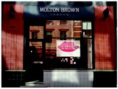 a storefront with a sign that says i love moloton brown on it